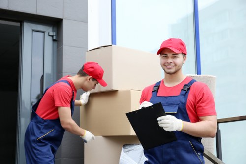 Furniture and household items being transported by Brompton movers
