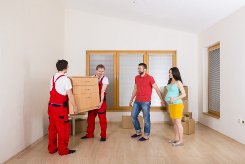 House movers preparing a Brompton home removal with packed boxes and furniture