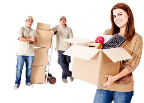 Boxes and furniture arranged inside a removal van for a Brompton move