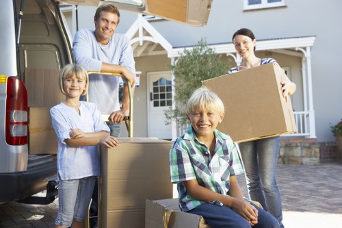Trained movers assessing lifting and handling procedures
